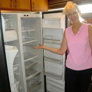 The Admiral shows off the newly installed Fridge!