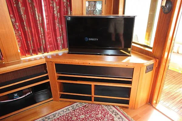 Hidden TV on electric lift